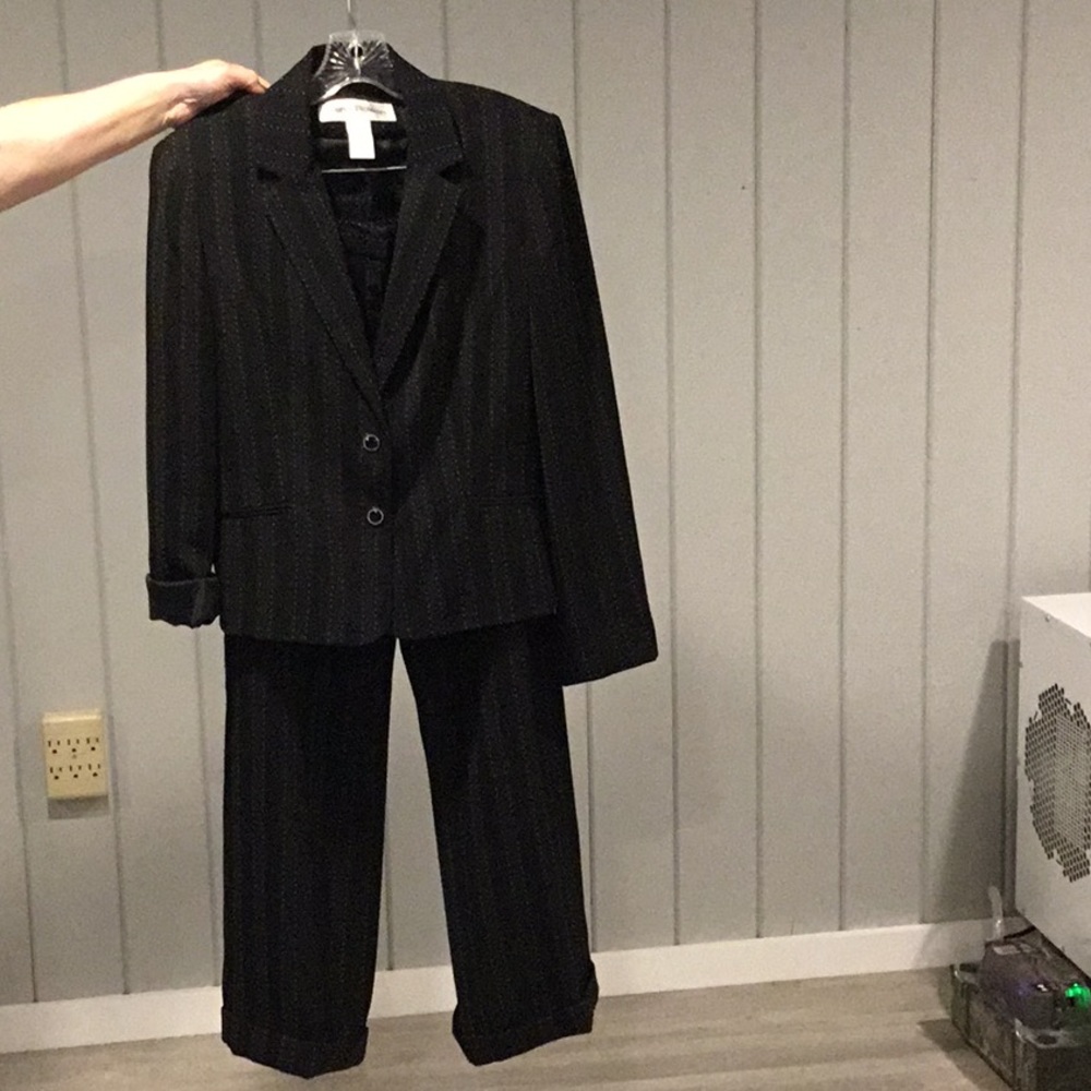 Minimal wear! Business attire Rena Rowen suit.